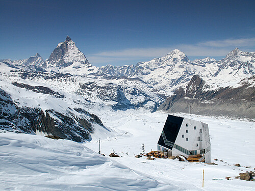 view of the Monte Rosa mountain hut and Gorner Glacier with the Matterhorn behind