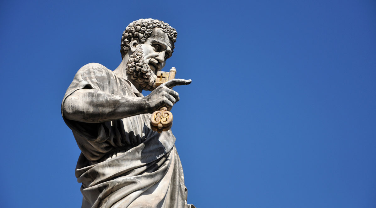 516898474 Statue of Saint Peter in Saint Peter square. Vatican city